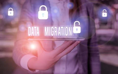 Word writing text Data Migration. Business concept for process of transferring Stock Photos