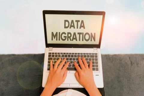 Word writing text Data Migration. Business concept for process of transferring Stock Photos