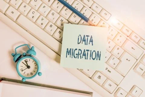 Word writing text Data Migration. Business concept for process of transferring Stock Photos
