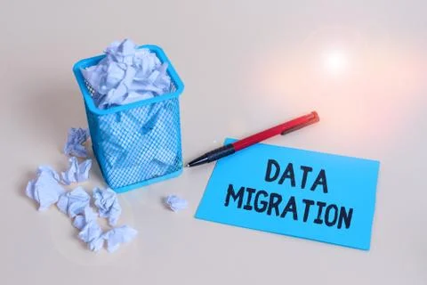 Word writing text Data Migration. Business concept for process of transferring Stock Photos