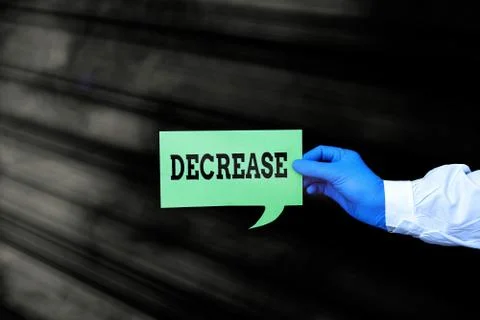 Word writing text Decrease. Business concept for the process of growing Stock Photos