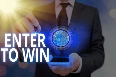Word writing text Enter To Win. Business concept for exchanging something value Stock Photos