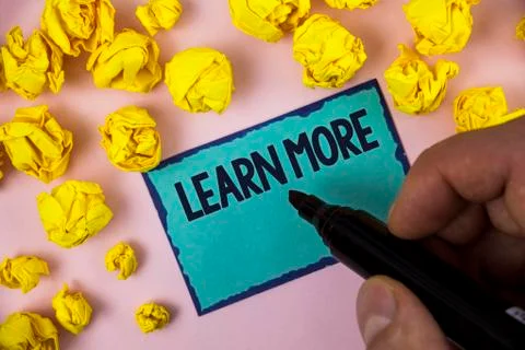 Word writing text Learn More. Business concept for Study harder Develop new s Stock Photos