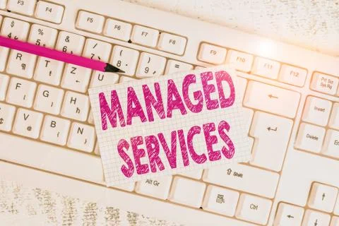 Word writing text Managed Services. Business concept for company that remotely Foto stock