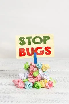 Word writing text Stop Bugs. Business concept for Get rid an insect or similar Stock Photos