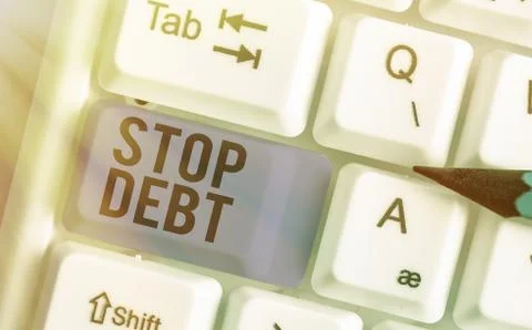 Word writing text Stop Debt. Business concept for does not owning any money or Stock Photos