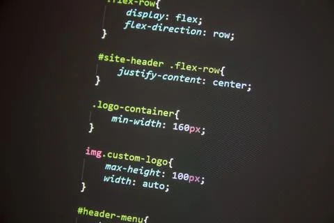 Wordpress theme code close up. Laptop screen with CSS code Stock Photos