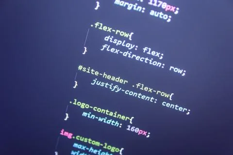 Wordpress theme code close up. Laptop screen with CSS code Stock Photos