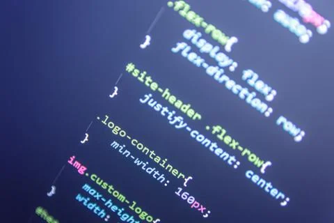 Wordpress theme code close up. Laptop screen with CSS code Stock Photos