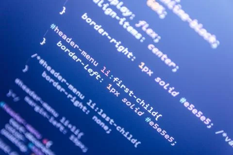 Wordpress theme code close up. Laptop screen with CSS code Stock Photos