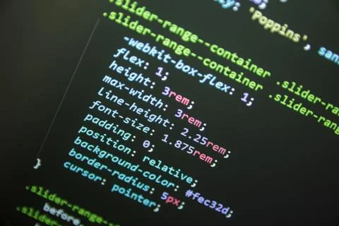 Wordpress theme code close up. Laptop screen with CSS code Stock Photos