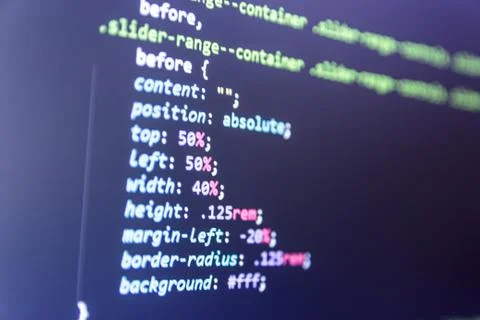 Wordpress theme code close up. Laptop screen with CSS code Stock Photos