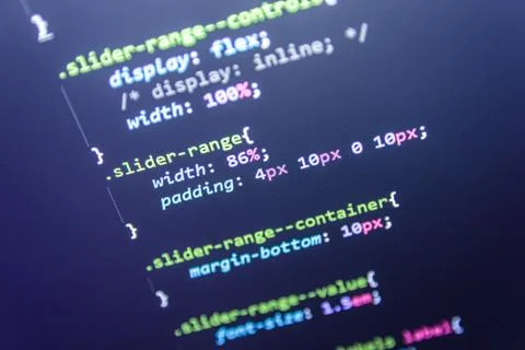 Wordpress theme code close up. Laptop screen with CSS code Stock Photos