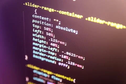 Wordpress theme code close up. Laptop screen with CSS code Stock Photos