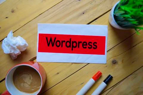 Wordpress write on the tissue with wooden table background Stockfoto's