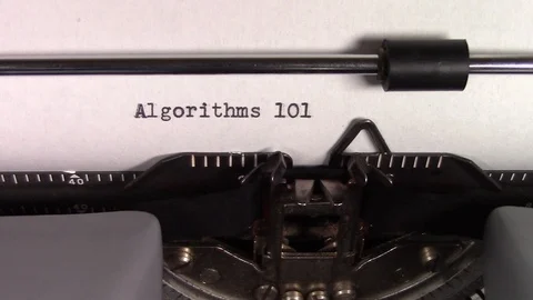 The words "Algorithms 101 " being typed on a typewriter Stockbeeldmateriaal 122879251