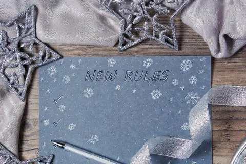 Words and patterns on gray paper. New year, new rules. Motivation, plan, sche 스톡 사진