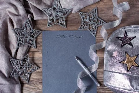 Words and patterns on gray paper. New year, new rules. Motivation, plan, sche Stock Photos