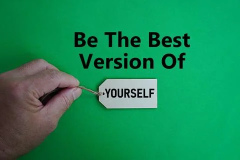 The words be the best version of, extension of yourself  held in hand Stock Photos