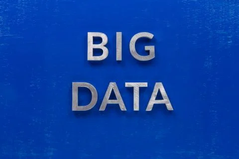 The words big data laid with silver metal characters on blue painted wooden 库存照片