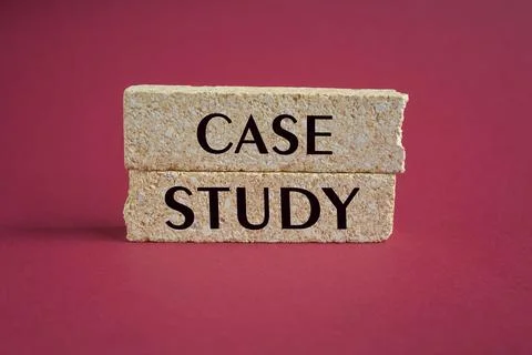 The words CASE STUDY is written on a brick blocks on red background. Stock Photos