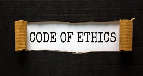 The words 'code of ethics' appearing behind torn black paper. Beautiful backg Stockfoto's