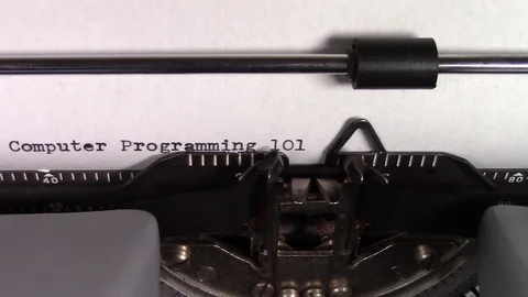 The words "Computer Programming 101" being typed on a typewriter 스톡 동영상 122890522
