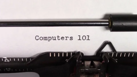 The words "Computers 101 " being typed on a typewriter Stockbeeldmateriaal 122529234