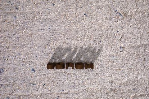 Words on a Concrete texture background. ROUGH words blocks and shadows. 3D re Stock Photos