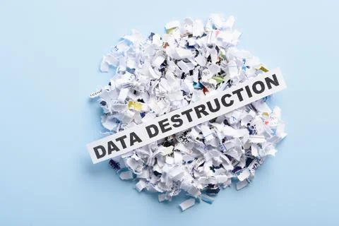 Words Data destruction on top of heap of cross shredded paper Stock Photos