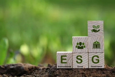Words ESG on a wood block and Future environmental conservation. Stock Photos