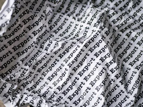 Words Export Seamless print on Crumpled paper for trading export import bus.. Foto stock
