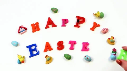 Words Happy Easter on white background, top view.Fridge Magnets - Happy Easter Stock Footage 171786892