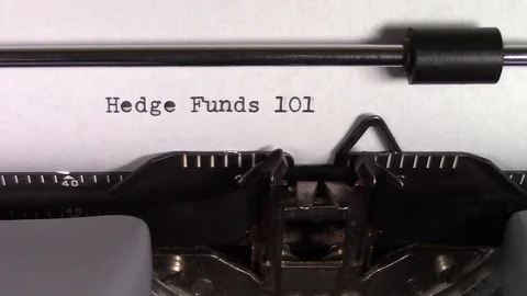 The words "Hedge Funds 101 " being typed on a typewriter Stockbeeldmateriaal 122876522