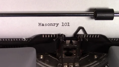 The words "Masonry 101 " being typed on a typewriter Stockbeeldmateriaal 122879050