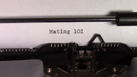 The words "Mating 101 " being typed on a typewriter Stockbeeldmateriaal 122870182
