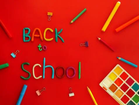 Words of multi-colored plasticine back to school and school supplies felt-tip Stock Photos