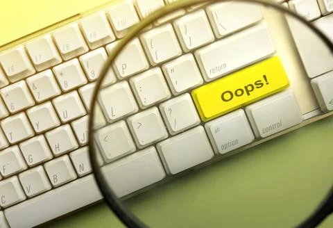 Words of Oops on the computer keyboard button Stock Photos