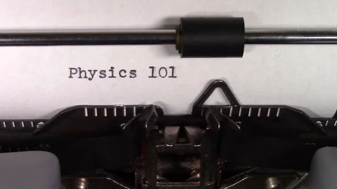 The words "Physics 101 " being typed on a typewriter Stock Footage 122528856