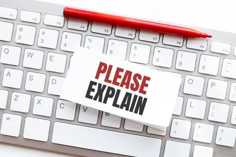 Words PLEASE EXPLAIN written on torn paper on a computer keyboard Stock Photos