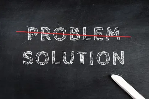 The words problem and solution are standing on a chalk board Stock Photos
