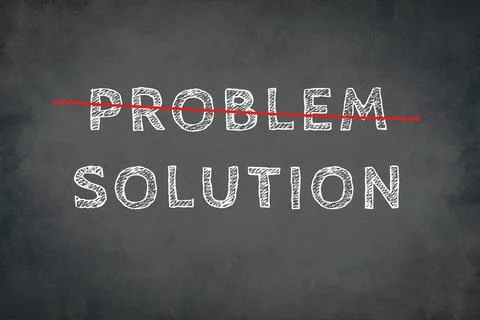 The words problem and solution are standing on a chalkboard Stock Photos