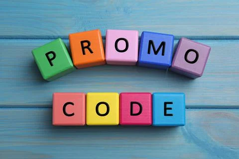 Words Promo Code made of colorful cubes on light blue wooden table, flat lay Stock Photos