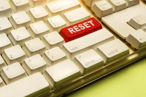 Words of Reset on the computer keyboard button Stock Photos
