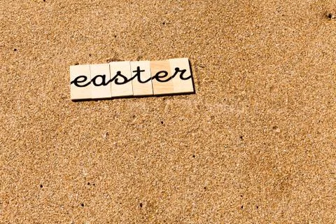 Words on sand Easter Stock Photos
