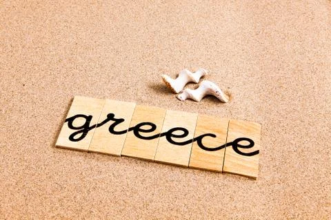 Words on sand Greece Stock Photos