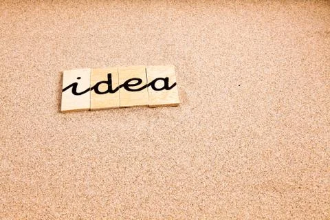 Words on sand Idea Stock Photos