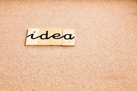 Words on sand Idea Stock Photos