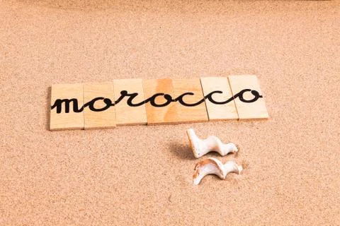 Words on sand Morocco Stock Photos