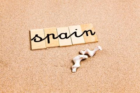 Words on sand Spain Stock Photos